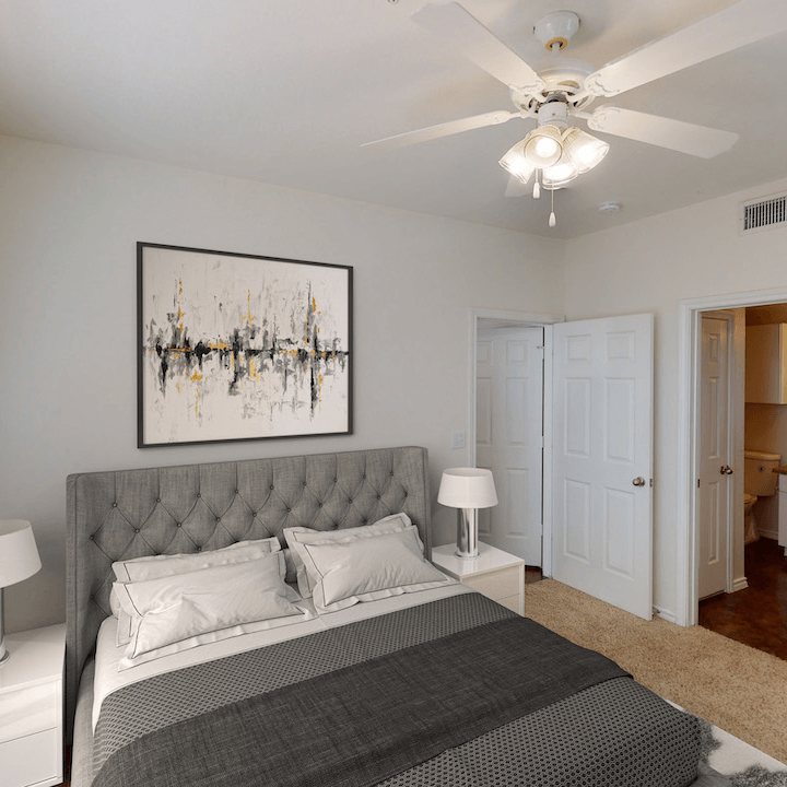 TDTX-2 bedroom with attached bathroom and overhead light