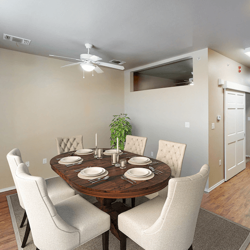 HWTX_gallery_2_jan23 Dining area with hardwood style floors at hunter's way apartments